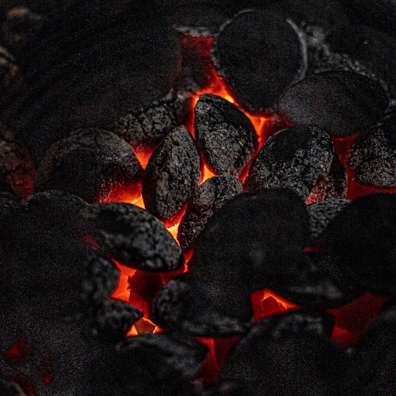 black and red stones on black soil